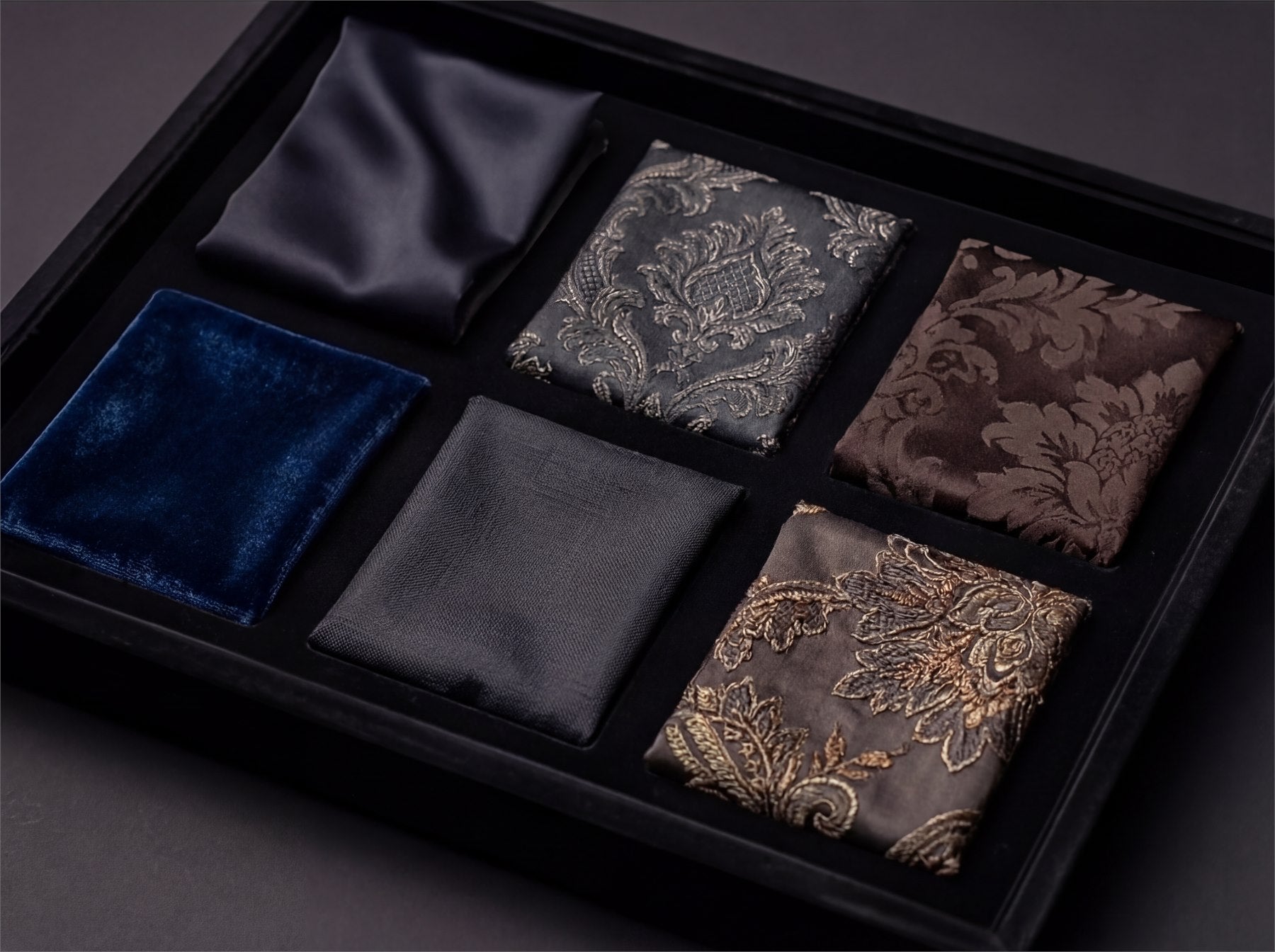 Material swatches arranged in a presentation tray.